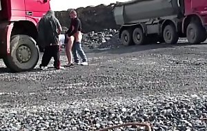 Blonde petite generalized drilled in public sex threesome at construction site by 2 guys