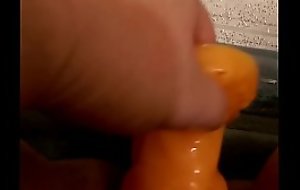 Orange dragon toy