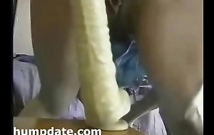Amateur wife rides huge dildo close by both holes