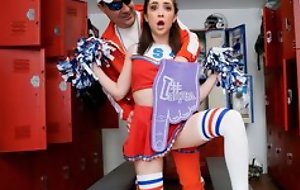 Petite cheerleader pleasuring cocky coach in the locker room