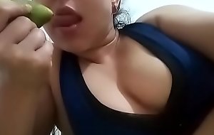 Catherine Osorio playing with Colombian Fruit