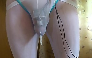Cumming with e-stim and chastity cage through panties