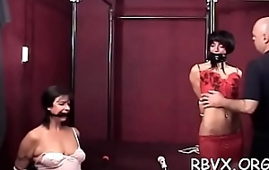 Busty chick gets ballgaged and aroused whilst being belted