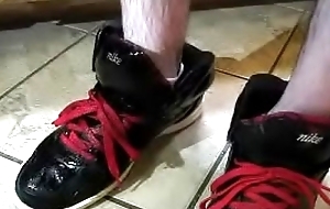 boy teen pissing Filling up some High Top Nikes
