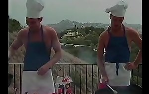 Couple of The Naked Chef Paul Morgan's assistants Matt Young and Marc Hamilton try to prepare barbeque sausages in their own way
