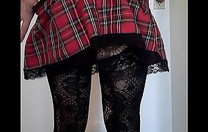 Sexy young crossdresser wearing sexy school skirt lingerie and showing perfect ass