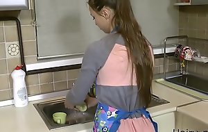 young wife in kitchen