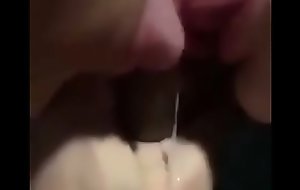 Two girls suck one cock for cum