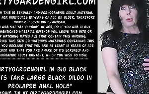 Dirtygardengirl in big black boots take large black dildo in prolapse anal hole