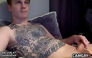 Tattooed boy masturbates in webcam