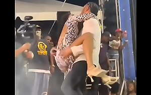 Hardcore drill with a Slim girl on stage while celebrity is performing