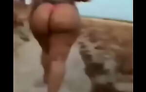 Two big asses out for a stroll on the beach.
