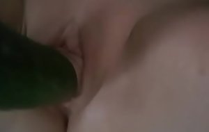 hawt slut sophi with a huge cucumber filling the brush distended pussy