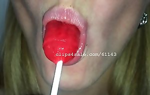 Mouth Charm - Jessika Eating a Lollipop